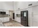 Sleek kitchen featuring stainless steel appliances, white cabinetry, and ample storage space for a modern and organized culinary experience at 202 Sweetwater Club Blvd, Longwood, FL 32779