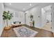 Stylish living room with hardwood floors, unique seating, and elegant decor at 2162 Lake Howell Preserve Ct, Maitland, FL 32751