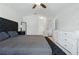 Spacious bedroom with ensuite bathroom, large mirror, and great natural light at 2277 Clearwater Dr, Deltona, FL 32738