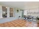 Enclosed patio with tile flooring and a view of the backyard at 2277 Clearwater Dr, Deltona, FL 32738