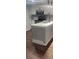 Modern kitchen with white cabinets, stainless steel appliances, and granite countertops at 2301 Oak Park Way # 101, Orlando, FL 32822