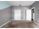 A bedroom featuring a walk-in closet and a doorway leading to the rest of the house at 2314 Pennsylvania Ave, Oviedo, FL 32765
