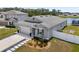 Charming home featuring a two car garage, well-kept lawn, and beautifully landscaped front yard at 2515 W End Dr, St Cloud, FL 34772
