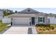 Charming single-story home featuring a two-car garage and inviting curb appeal at 2515 W End Dr, St Cloud, FL 34772