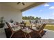 Inviting covered patio with comfortable seating, perfect for outdoor relaxation and entertaining at 2515 W End Dr, St Cloud, FL 34772