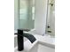 Close-up of a sleek black faucet and countertop in a renovated bathroom at 273 Marion Oaks Golf Rd, Ocala, FL 34473