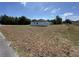 The exterior of the home includes a spacious yard with a beautiful view at 273 Marion Oaks Golf Rd, Ocala, FL 34473