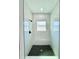 Newly renovated shower with marble tile walls and modern black fixtures at 273 Marion Oaks Golf Rd, Ocala, FL 34473