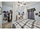 Bedroom showcasing a queen bed, carpet flooring, and decorative personalizations at 34423 Alameda Dr, Sorrento, FL 32776