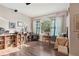 Spacious living room with hardwood floors, a large window, and ample natural light at 34423 Alameda Dr, Sorrento, FL 32776