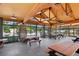 Spacious picnic area with tables, stone fireplaces, ceiling fans, and open-air design offers a great community gathering space at 34423 Alameda Dr, Sorrento, FL 32776
