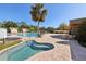 Community pool area features a smaller pool with a waterfall, a spa, and convenient access to restrooms and changing areas at 34423 Alameda Dr, Sorrento, FL 32776
