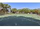Community tennis court provides an opportunity for residents to enjoy a friendly match in a well-maintained outdoor setting at 34423 Alameda Dr, Sorrento, FL 32776