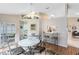 The dining room offers a view to the kitchen and has space for casual dining at 3661 Kingswood Ct, Clermont, FL 34711