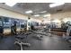 Spacious gym with ample weight machines, free weights and several treadmills at 3661 Kingswood Ct, Clermont, FL 34711