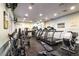 Well equipped gym with treadmills and weight machines for residents to use at 3661 Kingswood Ct, Clermont, FL 34711