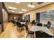 Spacious recreation room featuring tables, chairs, storage cabinets, and natural light at 3661 Kingswood Ct, Clermont, FL 34711