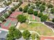 Community amenities include tennis and shuffleboard courts plus a play area at 3661 Kingswood Ct, Clermont, FL 34711