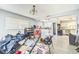 A dining room with two windows, a chandelier, and various objects at 409 Lake Ned Rd, Winter Haven, FL 33884