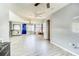 Spacious living room with tile floors and natural light at 409 Lake Ned Rd, Winter Haven, FL 33884