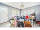 Living Room with light gray walls, white door and light-colored tile at 409 Lake Ned Rd, Winter Haven, FL 33884