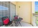 Outdoor balcony with seating and wrought iron railings at 411 Terrace Ridge Cir # 222, Davenport, FL 33896