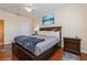 Bedroom featuring a comfortable bed, stylish décor, and ample natural light at 411 Terrace Ridge Cir # 222, Davenport, FL 33896
