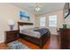 Comfortable bedroom with a large bed, stylish décor, and ample natural light at 411 Terrace Ridge Cir # 222, Davenport, FL 33896