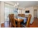 Dining room with modern light fixtures and access to the outdoor patio at 411 Terrace Ridge Cir # 222, Davenport, FL 33896