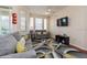 Cozy living room featuring modern décor and plenty of natural light at 411 Terrace Ridge Cir # 222, Davenport, FL 33896