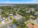 Beautiful aerial view overlooking the lake, with city skyline and tree-lined neighborhood at 4118 Teriwood Ave, Orlando, FL 32812
