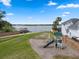 Beautiful backyard playground with lake views in a Gathering-friendly community, perfect for outdoor fun and relaxation at 4118 Teriwood Ave, Orlando, FL 32812