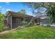 Fenced backyard with a lawn at 4118 Teriwood Ave, Orlando, FL 32812
