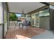 Covered patio with brick flooring, fan and furniture at 4118 Teriwood Ave, Orlando, FL 32812