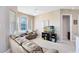 Cozy living room featuring comfortable seating, a ceiling fan, and a view of the outdoors at 422 Terrace Ridge Cir # 422, Davenport, FL 33896