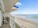 Spacious balcony with ocean views, offering a serene outdoor living space at 4601 S Atlantic Ave # 7030, Port Orange, FL 32127