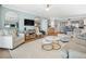Well-appointed living room with stylish furnishings and plenty of natural light in this modern condo at 4601 S Atlantic Ave # 7030, Port Orange, FL 32127