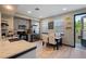 Modern kitchen with stainless steel appliances, granite countertops, and a breakfast nook with a view at 4725 Anson Ln, Orlando, FL 32814