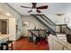 View of Living Space area with staircase and exercise equipment at 4725 Anson Ln, Orlando, FL 32814
