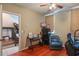 Office with a hardwood floor, work desk, printer, and a black filing cabinet at 4725 Anson Ln, Orlando, FL 32814
