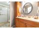 Bathroom with shower, vanity and ample lighting at 5001 Tangerine Ave, Winter Park, FL 32792