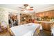 A dining room with hardwood flooring, a ceiling fan and dining table set for six at 5001 Tangerine Ave, Winter Park, FL 32792