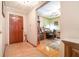 Inviting entryway featuring tile flooring, and entry into an office at 5001 Tangerine Ave, Winter Park, FL 32792