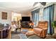 A living room with hardwood flooring, and a ceiling fan at 5001 Tangerine Ave, Winter Park, FL 32792