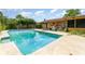 Backyard pool and patio for relaxation and outdoor entertaining at 5001 Tangerine Ave, Winter Park, FL 32792