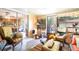 Comfortable sunroom with wicker furniture, lots of light and indoor/outdoor feel at 5001 Tangerine Ave, Winter Park, FL 32792