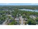 Aerial view of the neighborhood, surrounding green space, and waterway at 507 Peach Tree Ln, Altamonte Springs, FL 32701