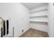 Basement features white walls, shelving, tile floor, and utility hookups at 507 Peach Tree Ln, Altamonte Springs, FL 32701