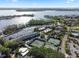 Expansive aerial view capturing the complex's desirable location close to lakes, tennis courts and lush surroundings at 6330 Masters Blvd # N4, Orlando, FL 32819