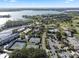 Wide aerial shot highlighting the complex's prime location near a golf course, pool, and tennis facilities at 6330 Masters Blvd # N4, Orlando, FL 32819